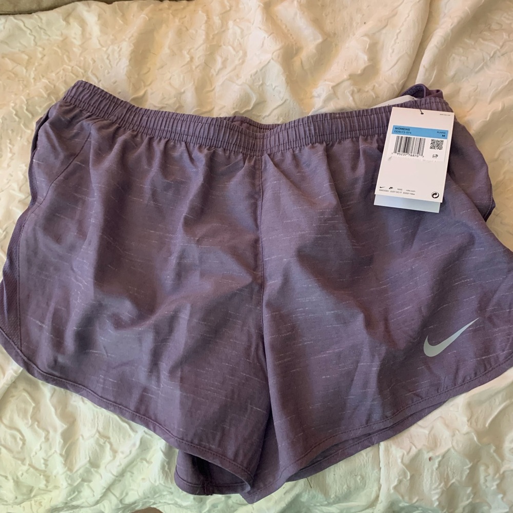 Nike women’s running shorts with tags.  Size medium.